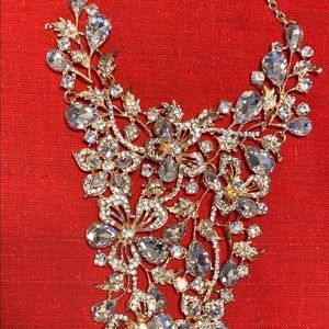 Gold and crystal Natasha jewelry.